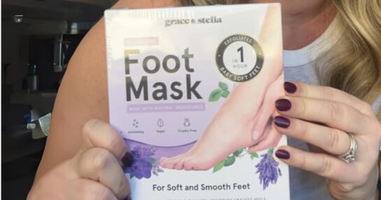 persons hands holding a box of Grace & Stella foot masks