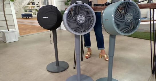 3 Shark FlexBreeze fans lined up in front of a table